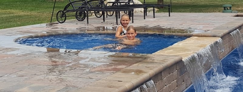 A Splash Pad Adds Big Value To Any PoolScape