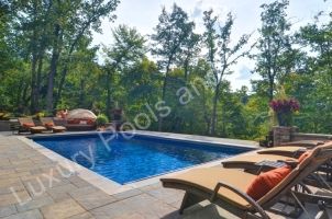 Lancaster Ohio Palm Beach inground swimming pool with power retractable cover